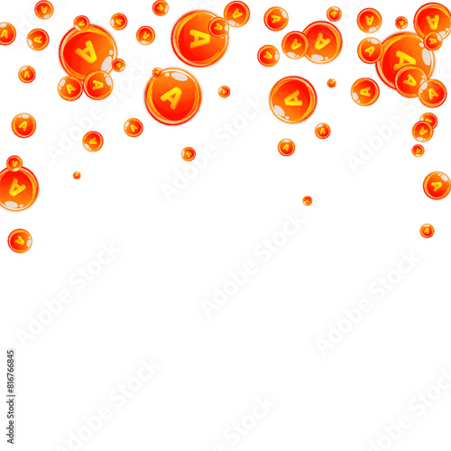 Vitamin A round capsules scattered randomly.
