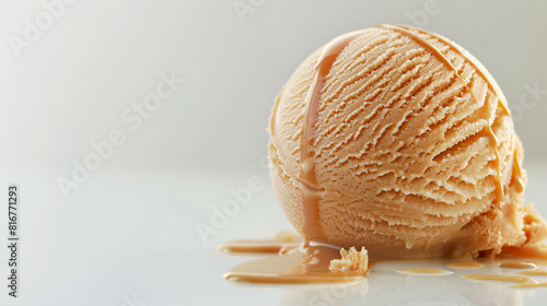 Delicious caramel ice cream ball on white background -
