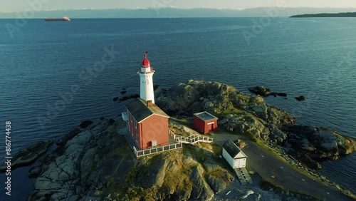 Drone footage of Fisgard Lighthouse National Historic Site, on Fisgard Island in BC, Canada photo