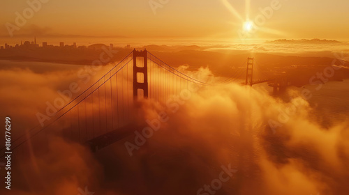 In the early hours of morning, the Golden Gate Bridge is enveloped in a golden haze as the sun rises behind the fog, casting long shadows over the mist-covered waters below.