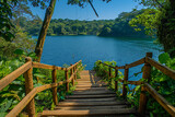 A wooden bridge leads to a beautiful lake