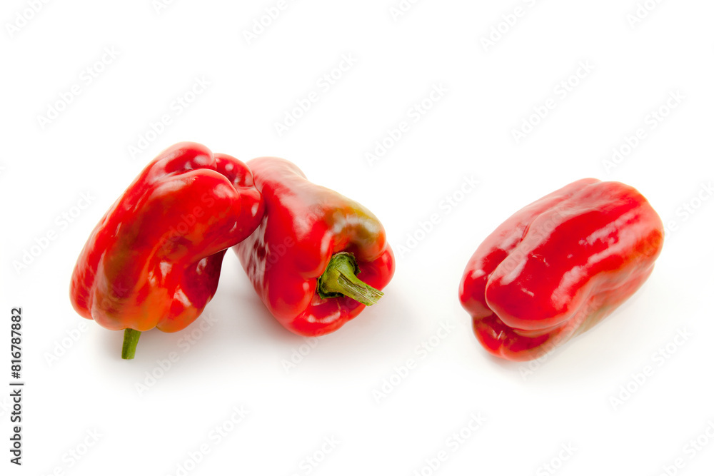 Three red bell pepper isolated on white background with clipping path. . Three red bell pepper isolated on white background with clipping path. .