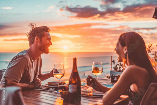 A happy couple enjoying a romantic dinner on a rooftop at sunset.