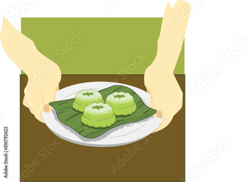 green steamed cake with topping grated coconut