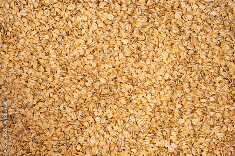 Oat-flakes as a background. Top view. Oat-flakes as a background. Top view.