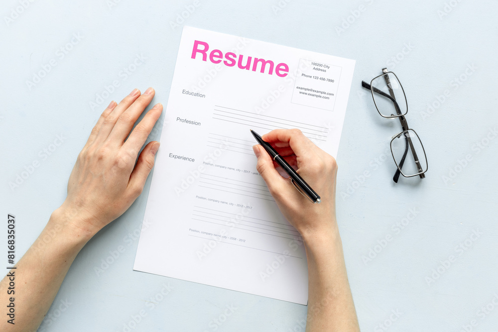 We are hiring. Employee filling resume files. Or HR manager reviewing resume applications We are hiring. Employee filling resume files. Or HR manager reviewing resume applications