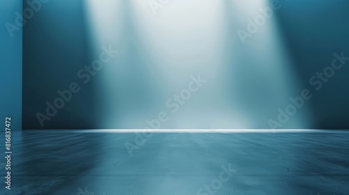 Light blue empty wall and smooth floor with interesting light glare. Background for the presentation. 