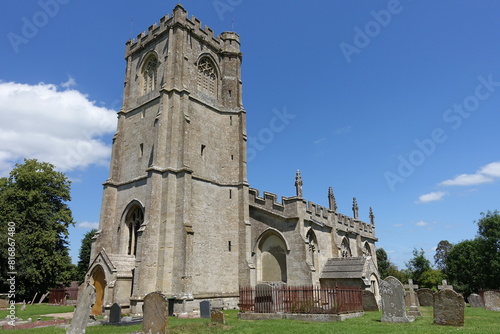 View of an old English church and grounds - travel and architecture themed photograph in colour
