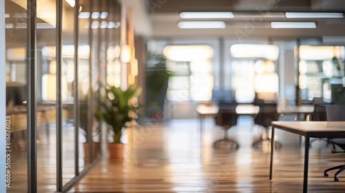 Blurred background of a modern office workspace with natural light for minimalist design projects