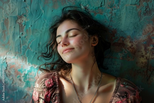 Peaceful portrait of a young woman basking in the warmth of soft sunlight