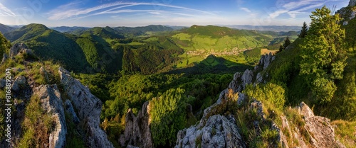Rock and forest at spring in Slovakia. View from the top of The Vapec hill in The Strazov Mountains. Seasonal natural scene.