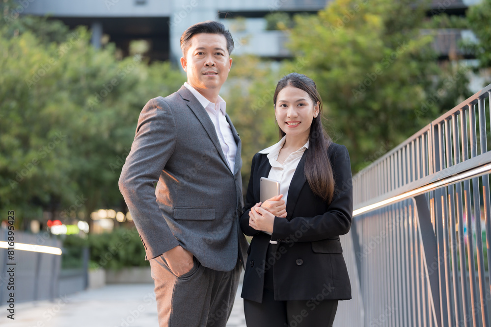 Confident business colleagues in urban setting Confident business colleagues in urban setting