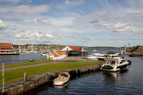 Beautiful town Kristiansand in Norway, family visiting Norway for summer vacation photo