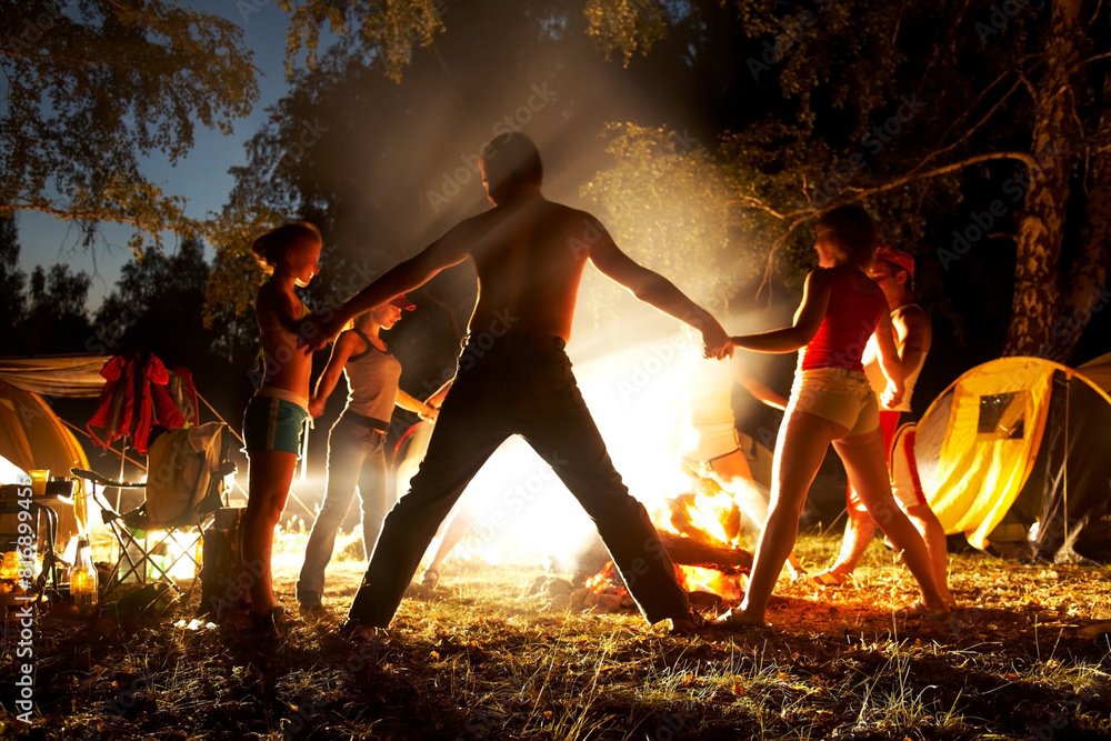 by the fire outdoors