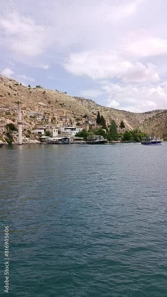 Boat tour through the flooded city. Halfeti, Sanliurfa, Turkey
Boat tour through the flooded city. Halfeti, Sanliurfa, Turkey