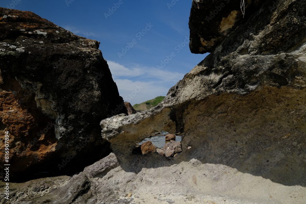 rocks on the beach and blue sky rocks on the beach and blue sky