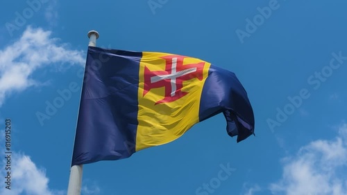 Flag of Madeira, an atlantic island under the authority of Portugal, flying in the wind, slighly slowed down. photo