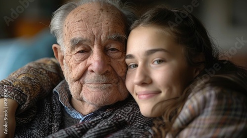 Shared moment of comfort and support between an older grandparent and a younger family member during a respite care service
