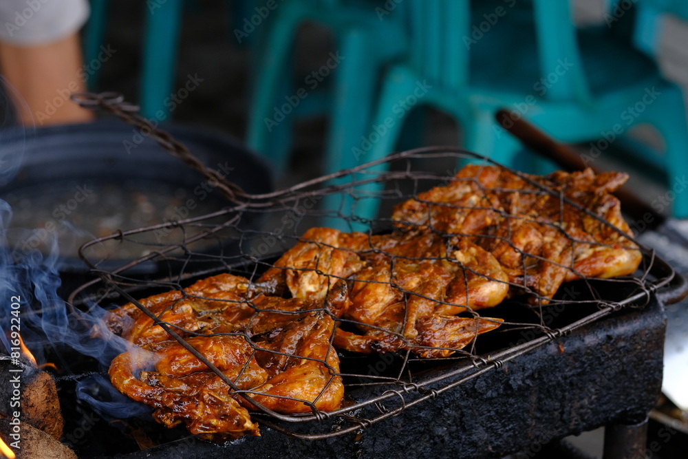 ayam bakar Taliwang is Taliwang grilled chicken is a typical food of Lombok and Sumbawa, West Nusa Tenggara. Spicy shrimp paste chicken. Indonesian food. ayam bakar Taliwang is Taliwang grilled chicken is a typical food of Lombok and Sumbawa, West Nusa Tenggara. Spicy shrimp paste chicken. Indonesian food.