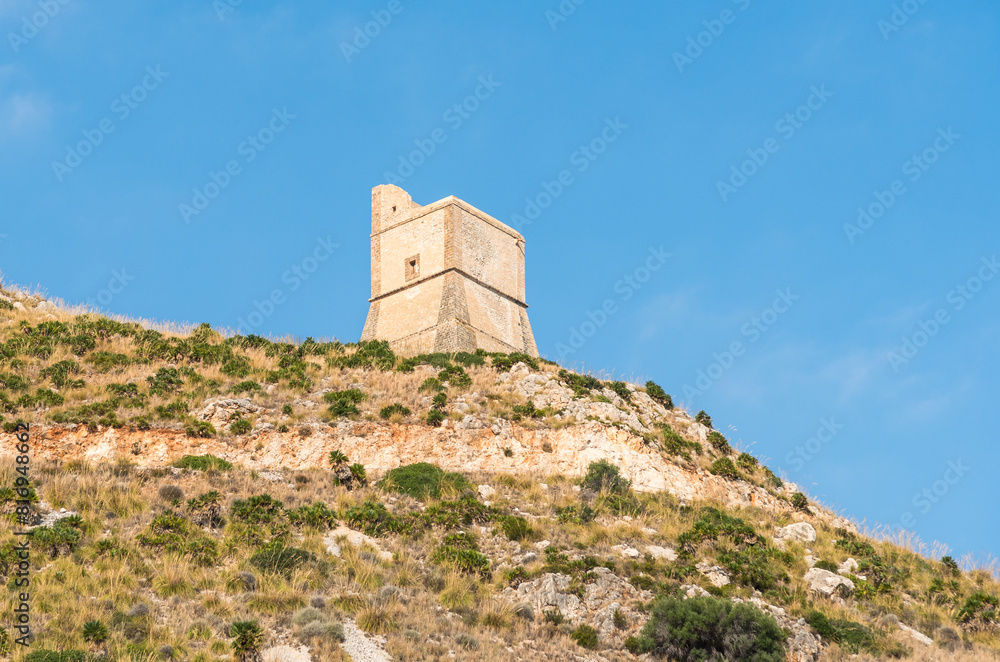 Watchtower at the Faraglioni of Scopello in Zingaro nature reserve (Riserva dello Zingaro) in the Mediterranean sea in the province of Trapani, Sicil Watchtower at the Faraglioni of Scopello in Zingaro nature reserve (Riserva dello Zingaro) in the Mediterranean sea in the province of Trapani, Sicil