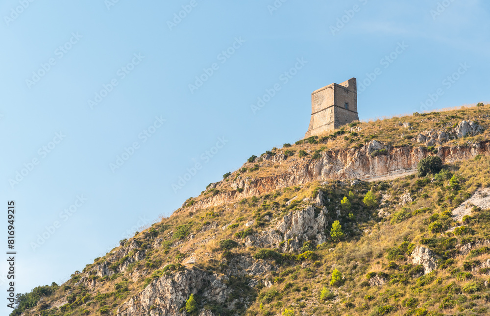 Watchtower at the Faraglioni of Scopello in Zingaro nature reserve (Riserva dello Zingaro) in the Mediterranean sea in the province of Trapani, Sicil Watchtower at the Faraglioni of Scopello in Zingaro nature reserve (Riserva dello Zingaro) in the Mediterranean sea in the province of Trapani, Sicil