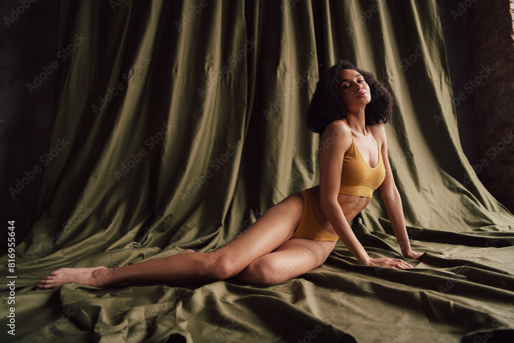 No retouch photo of gorgeous adorable nice girl studio daylight isolated on fabric khaki color background No retouch photo of gorgeous adorable nice girl studio daylight isolated on fabric khaki color background