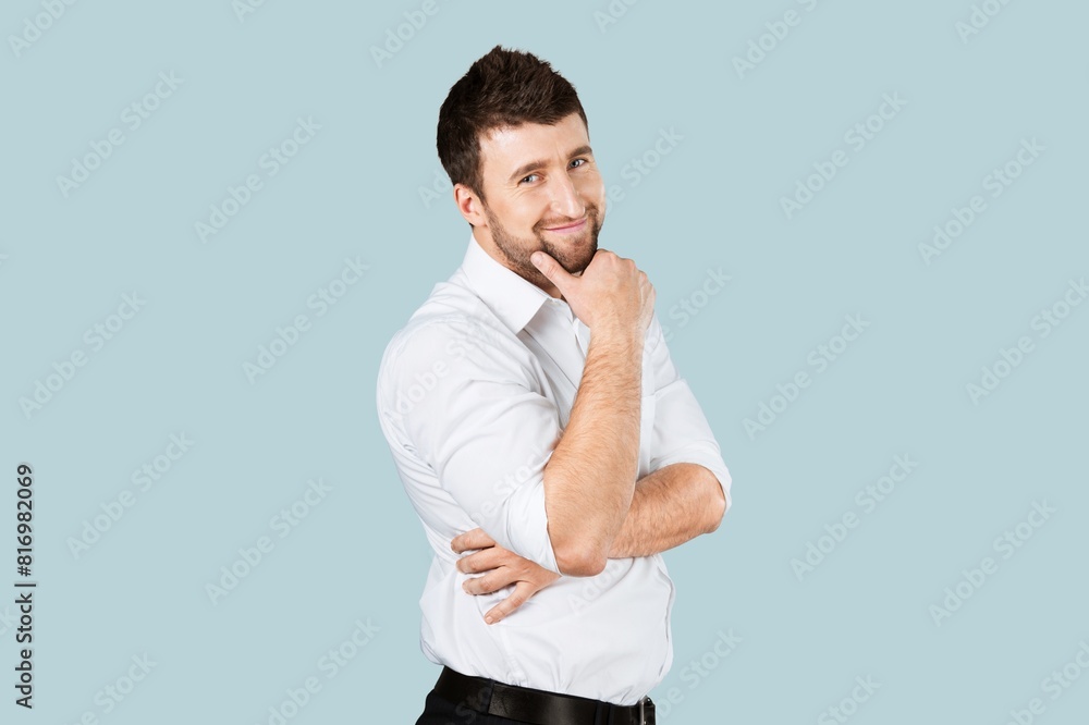 Young smiling successful business man posing Young smiling successful business man posing