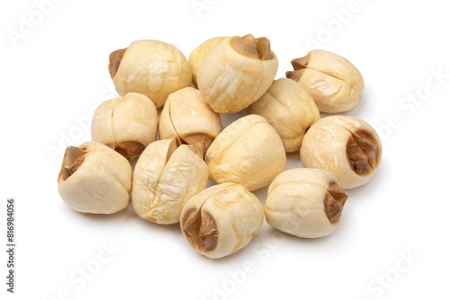 Heap of dried Lotus seeds close up isolated on white background