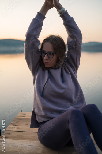 Woman sitting on the pier