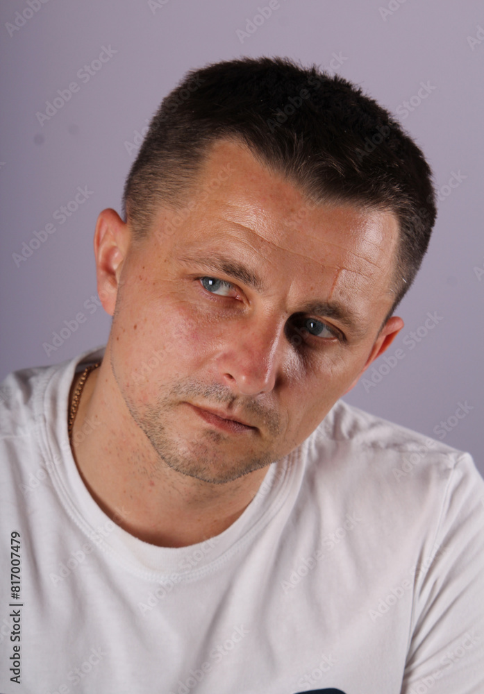 portrait of a handsome man with a discerning eye portrait of a handsome man with a discerning eye