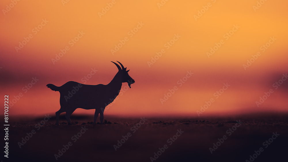 silhouette of a goat against a sunset sky background with copy space for the Eid Adha celebration concept, in a silhouette style. silhouette of a goat against a sunset sky background with copy space for the Eid Adha celebration concept, in a silhouette style.