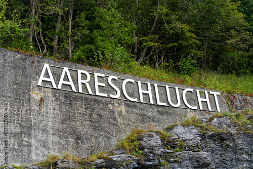 Lettering Aare Gorge at entrance of Landmark on a cloudy late summer day at Haslital Valley in the Swiss Alps. Photo taken September 19th, 2023, Grimsel, Canton Bern, Switzerland. photo