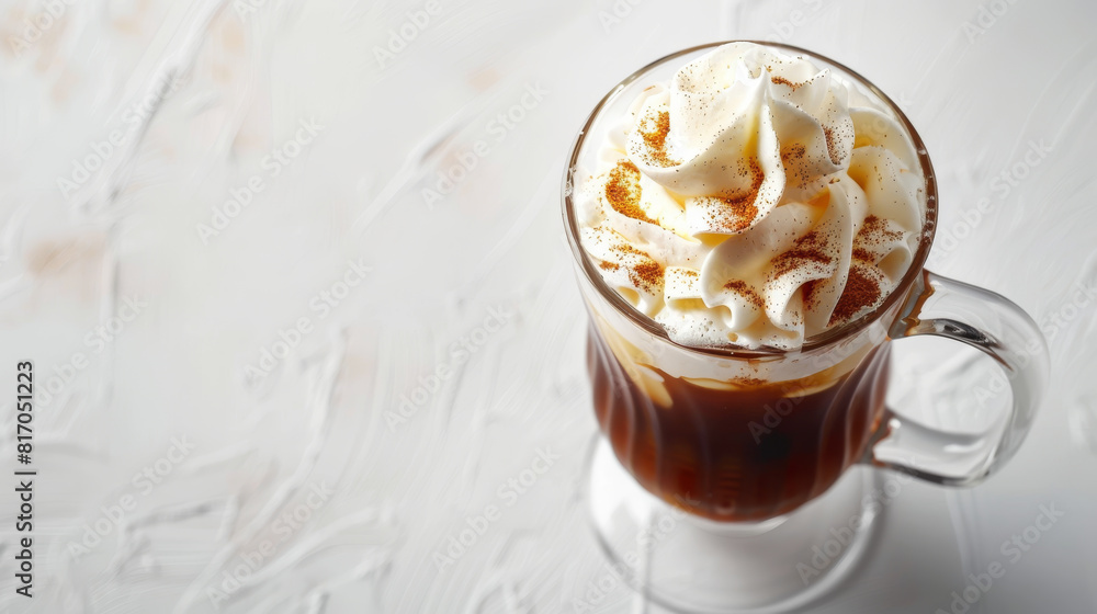 A glass of coffee with whipped cream on top A glass of coffee with whipped cream on top