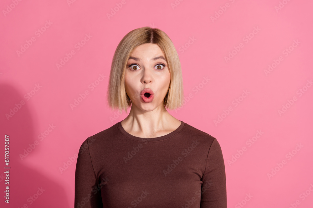Photo of pretty lovely impressed girl wear trendy brown clothes open mouth isolated on pink color background Photo of pretty lovely impressed girl wear trendy brown clothes open mouth isolated on pink color background