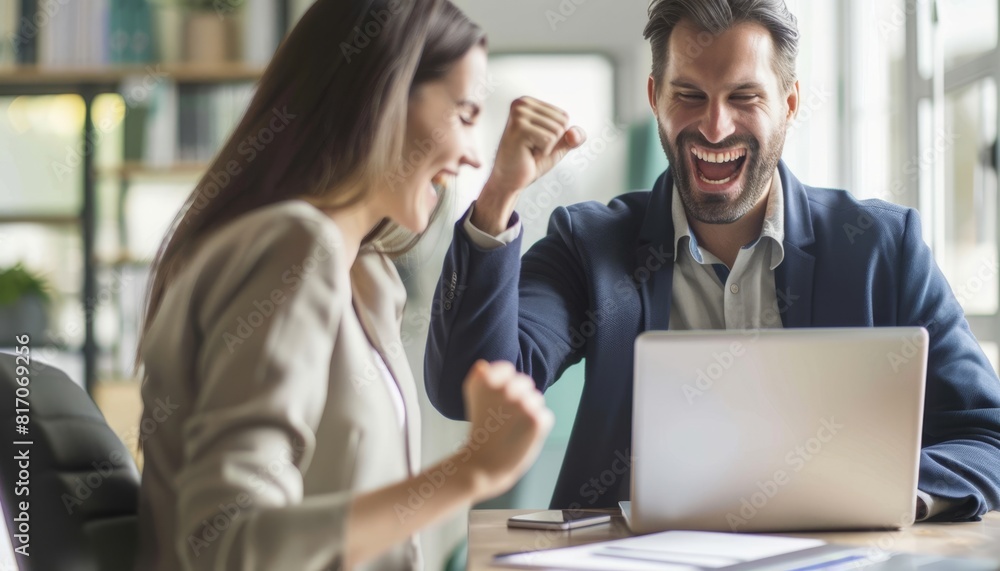 Business people celebrating success in office. Business people celebrating success in office.