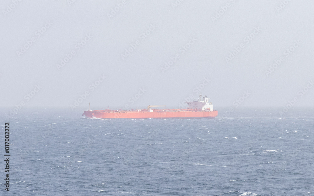 Passing unknown tanker in Atlantic Ocean on Very foggy day