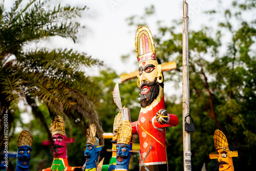 Colorful effigies of demon king Ravan of paper made on the hindu festival of Dussehra Vijayadashami shot with shallow depth of field photo