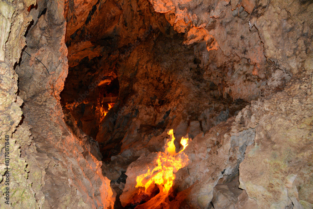 a cave with a fire inside of it a cave with a fire inside of it