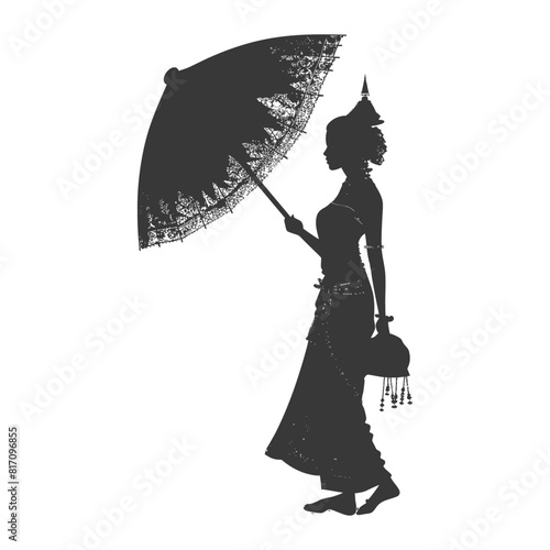 silhouette independent thai women wearing chut thai with umbrella black color only