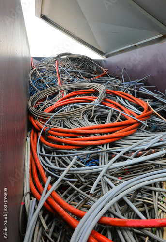 electrical cords at the electrical cord scrapyard for recycling copper and polluting plasti photo