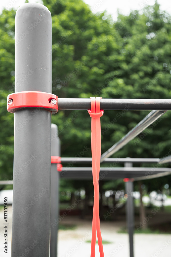 horizon bars with elastic exercise band .  outdoor gym concept
