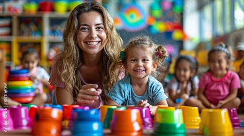 A woman and a child are engaged in playful activities with colorful cups in a classroom setting