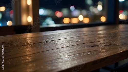 Wooden table surface with city lights at night