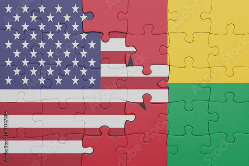 Canvas Print puzzle with the colourful national flag of guinea bissau and flag of united states of america