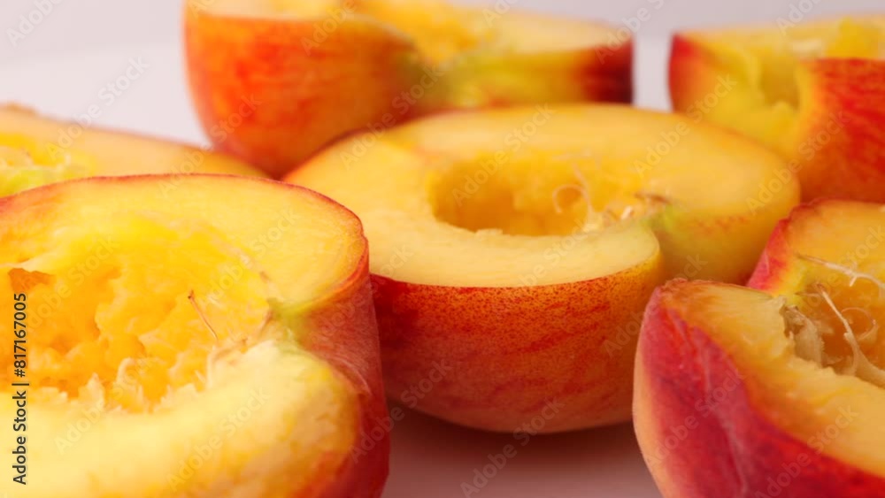 Fresh peach halves, rotation in circle. Fresh organic fruit, Turning. selective focus. Fresh peach halves, rotation in circle. Fresh organic fruit, Turning. selective focus.