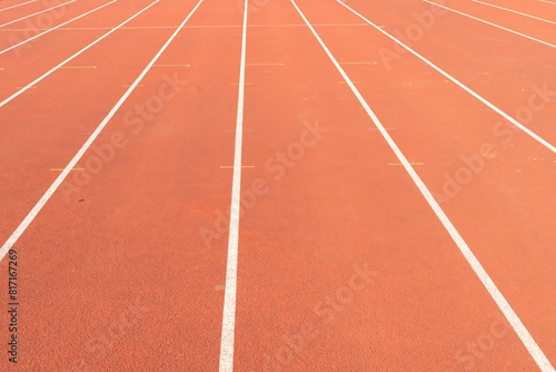 Synthetic track with white lines in the athletics stadium..
