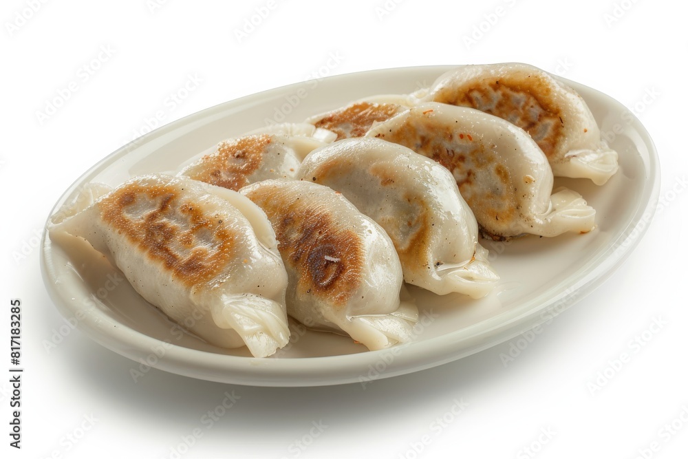 Dumplings in a plate isolated on white background Dumplings in a plate isolated on white background