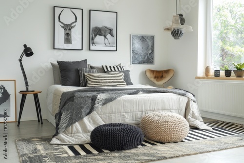 A comfortable bedroom with furniture  grey rug  and a window in a house