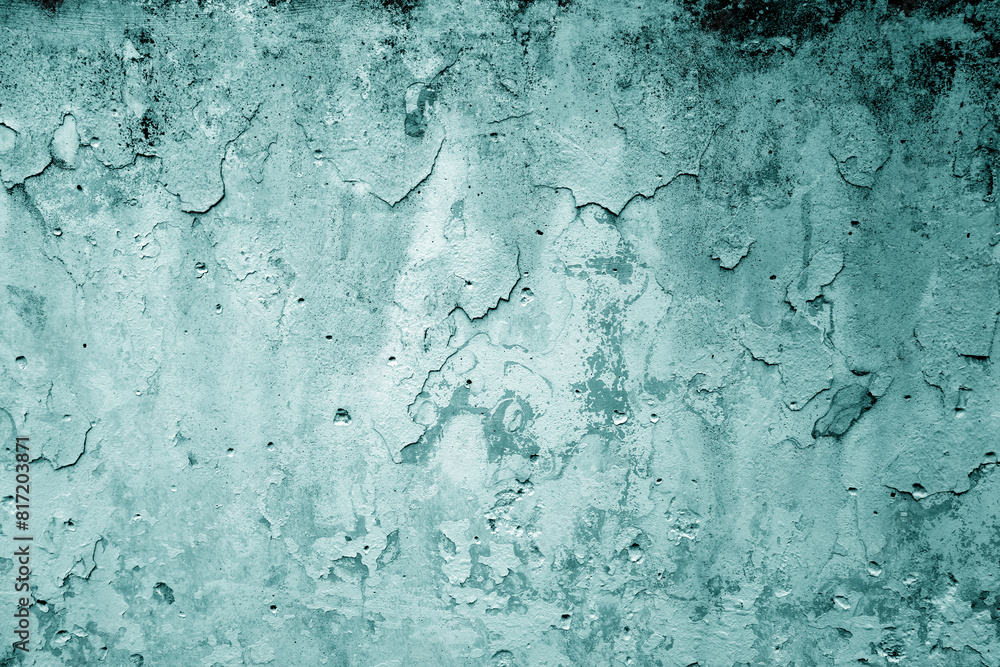Peeling paint on grungy plaster wall. Cyan color. Peeling paint on grungy plaster wall. Cyan color.