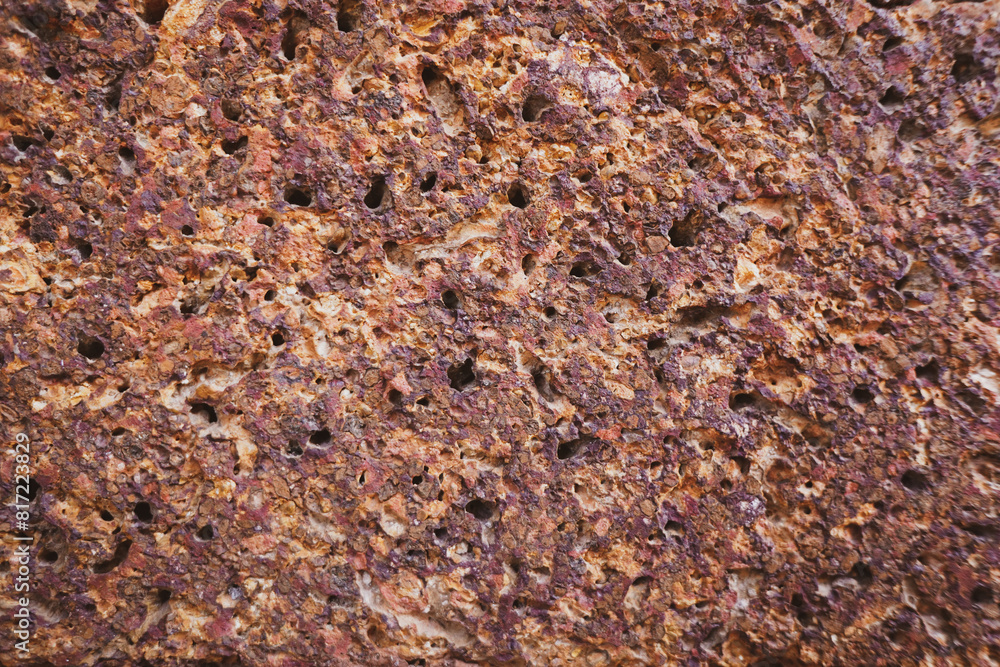 Empty old red grain stone brick wall made with antique blocks for abstract seamless background and texture. beautiful patterns, space for work, close up. Empty old red grain stone brick wall made with antique blocks for abstract seamless background and texture. beautiful patterns, space for work, close up.